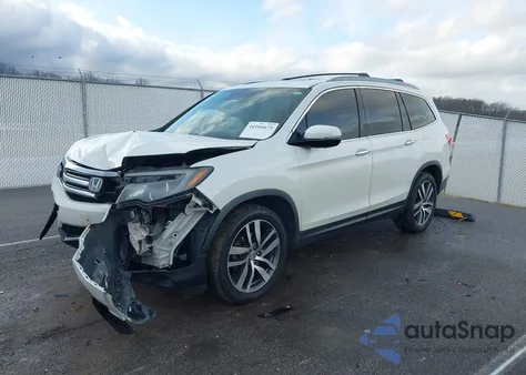 2016 Honda Pilot Elite z USA, uszkodzony, nr VIN 5FNYF6H01GB106574